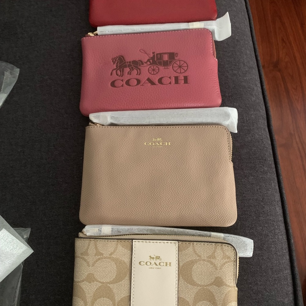 Coach Red, Beige, pink, and Tan Wristlets